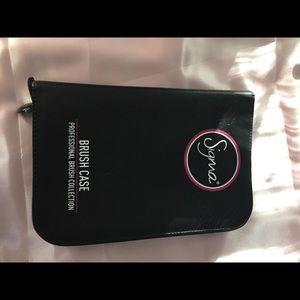 Brand new Sigma brush zip folder.